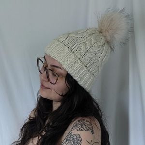 Cream colored knit hat